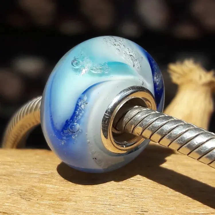 Bedel Atlantis in massief meerkleurig glas + deeltjes crematie-as