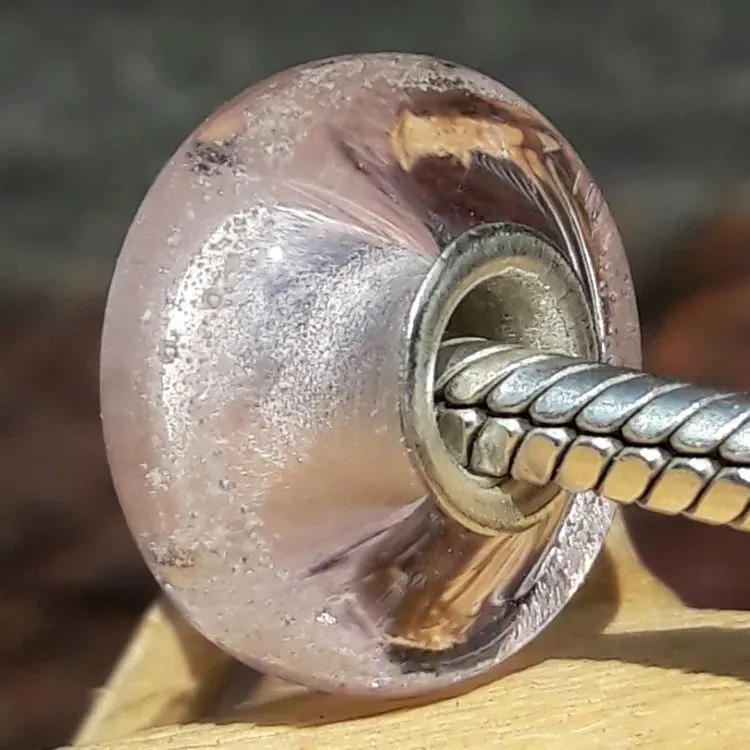 Bedel van massief Roze glas met deeltjes crematie-as