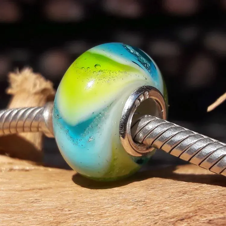 Bedel Tetra in massief meerkleurig glas + deeltjes crematie-as