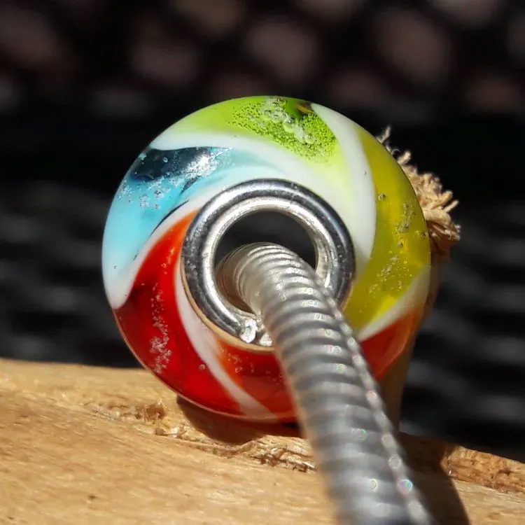 Bedel Rainbow in massief meerkleurig glas + deeltjes crematie-as