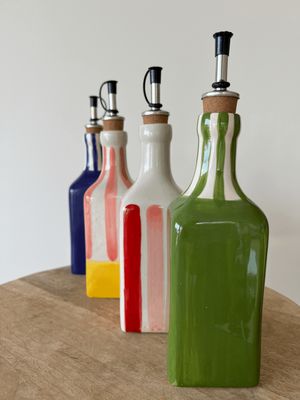 Handgemaakte Olijfoliefles &amp; Raspbordje