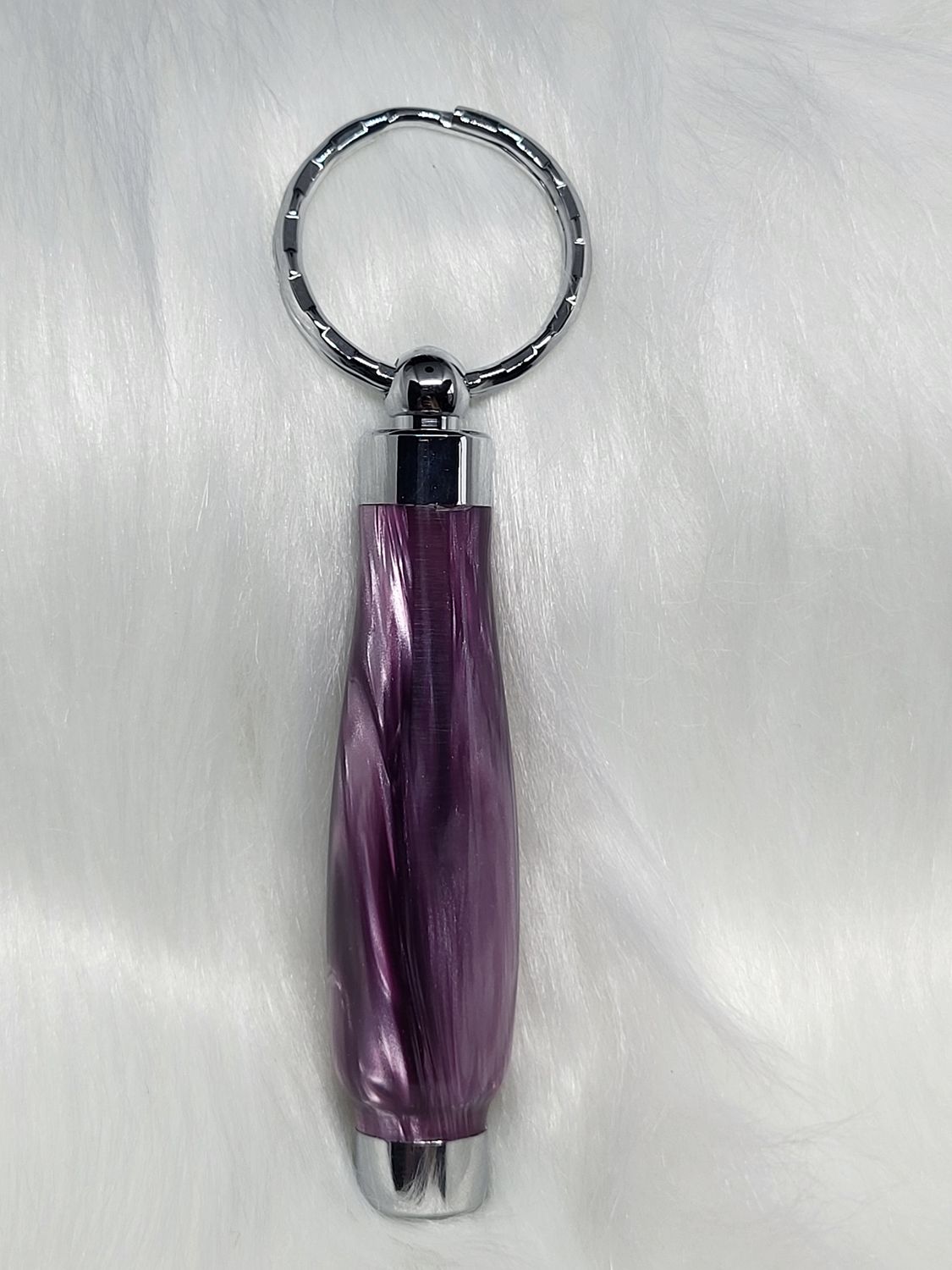 Handgemaakte sleutelhanger in epoxy hars