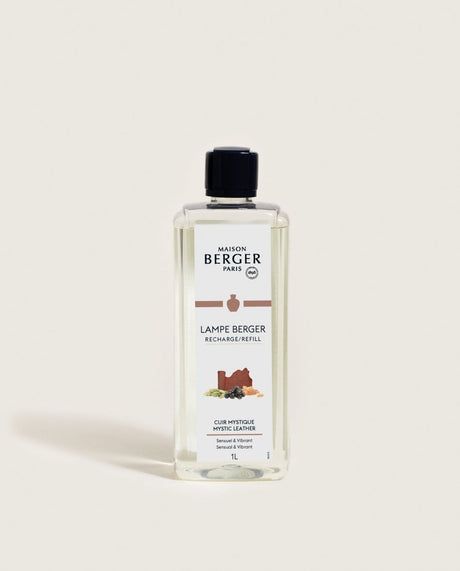 Maison Berger Lampe Berger fragrance refill bottle, clear liquid, black cap, brown label, white bac…