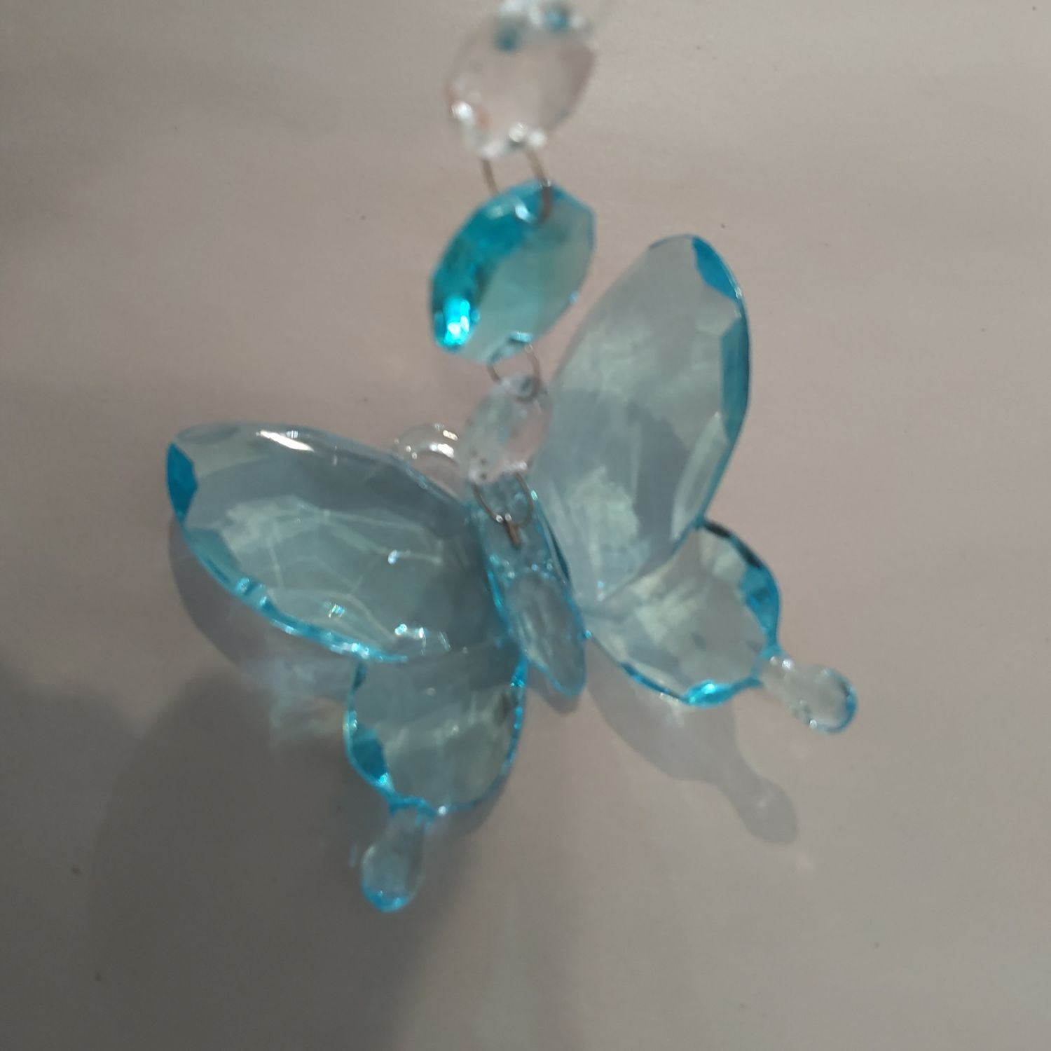 Turquoise Butterfly With Prisms