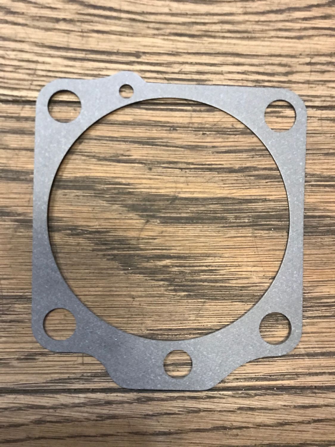 Dichtung Zylinderfuß vorn von James für Harley Panhead 48-62, Pappe