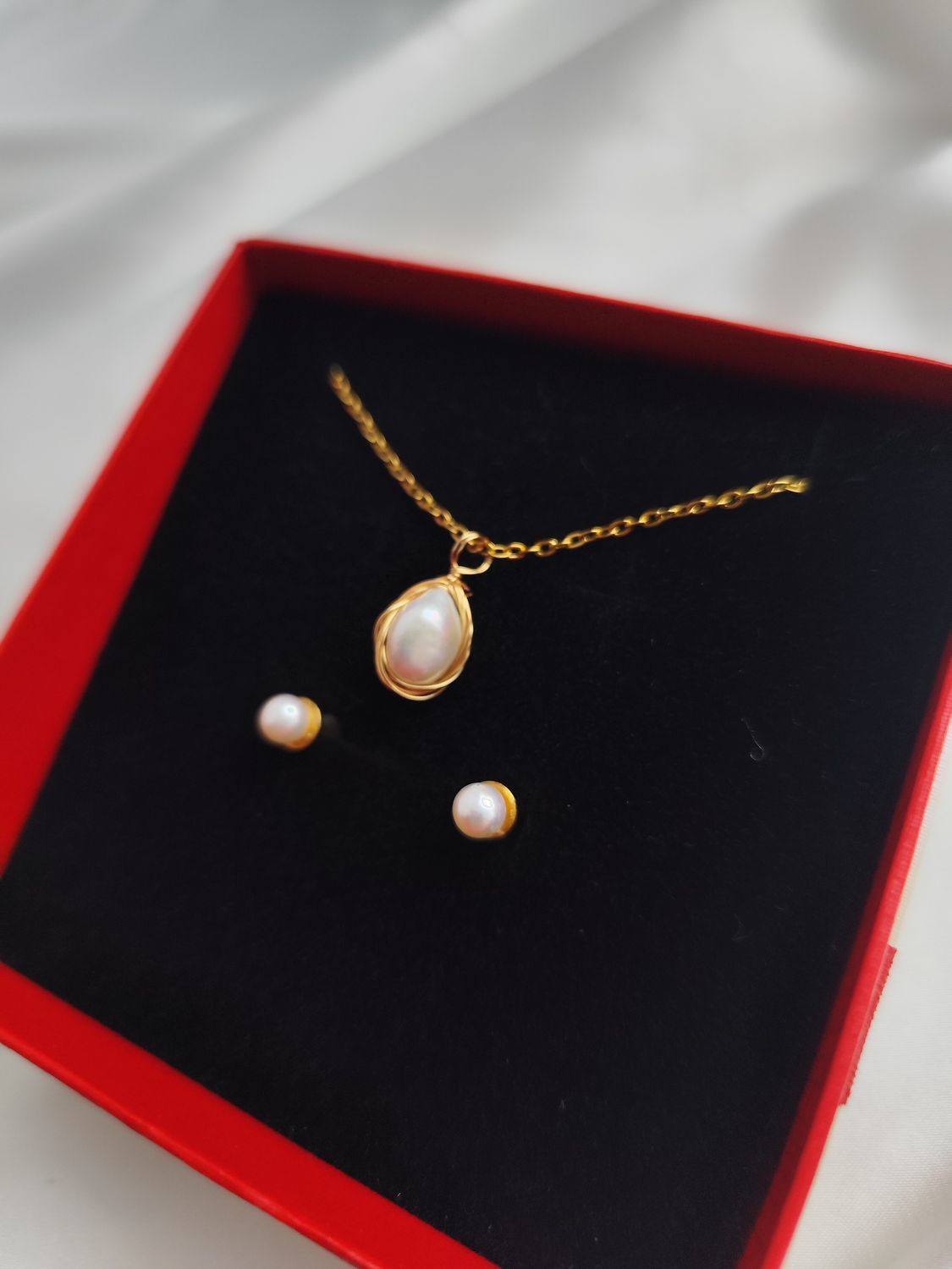 Zestaw z oplecioną perłą