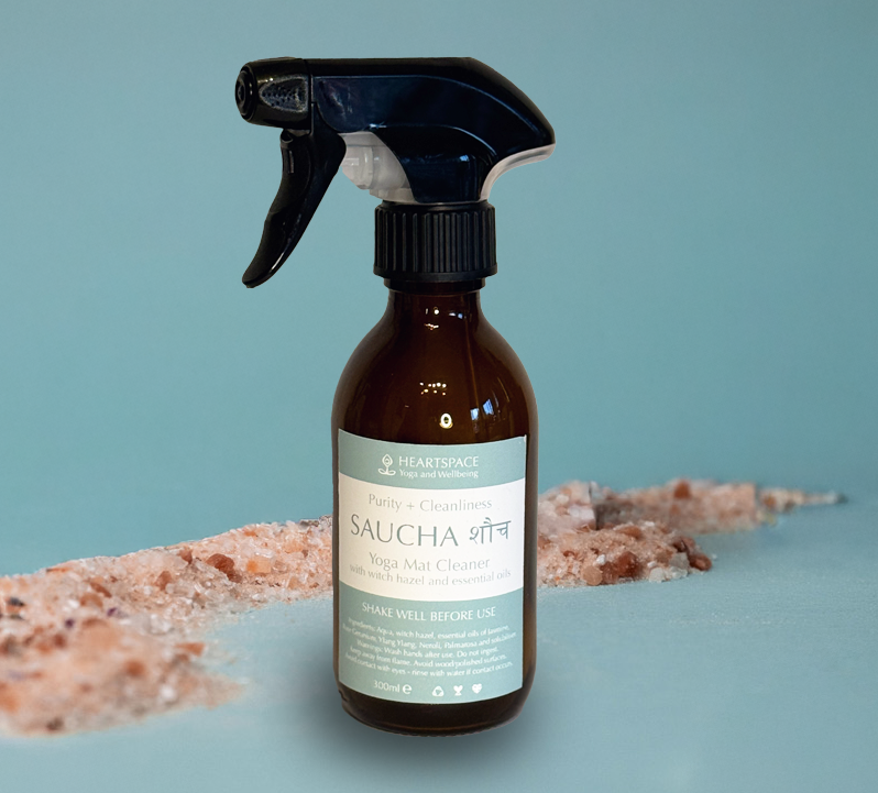 Product shot of HeartSpace 'Saucha' mat spray  in 300ml amber glass bottle with trigger spray.