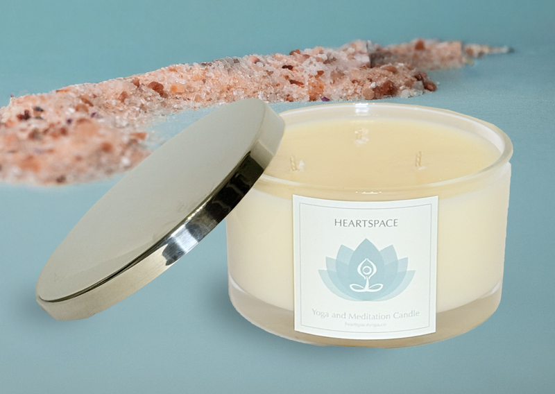 Product shot of HeartSpace Yoga and Meditation large 3 wick candle in glass jar with silver metal lid. 
