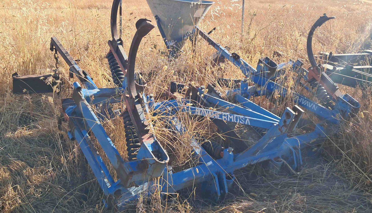 Chisel GIL de 13 brazos con rastra.