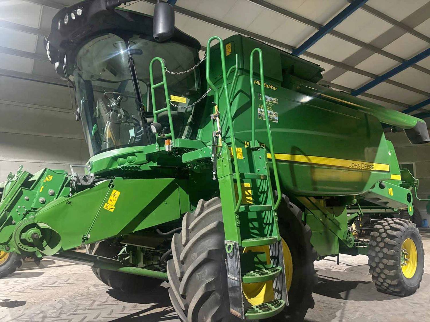 cosechadora john deere W650 cereal criba sacudidor doble traccion tracción siega paja tolva sinfin hora motor trilla alpaca