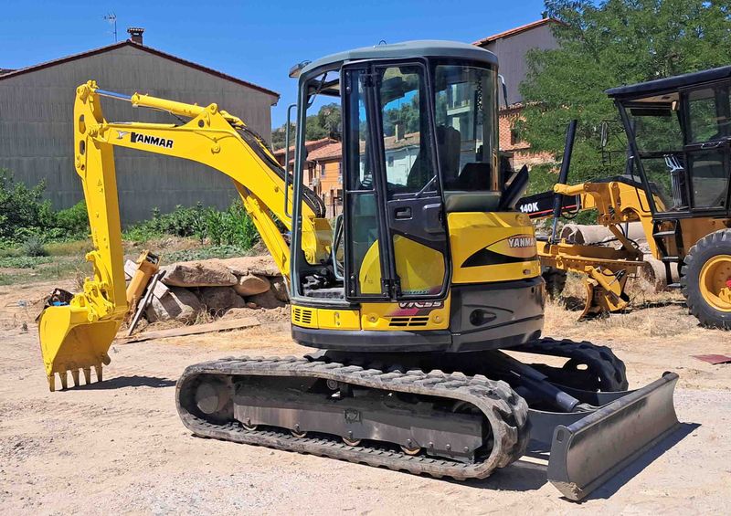 miniexcavadora Yanmar VIO55 CE giro 360 péndulo pendulo retro cadenas goma cazo limpieza instalacion martillo acondicionado