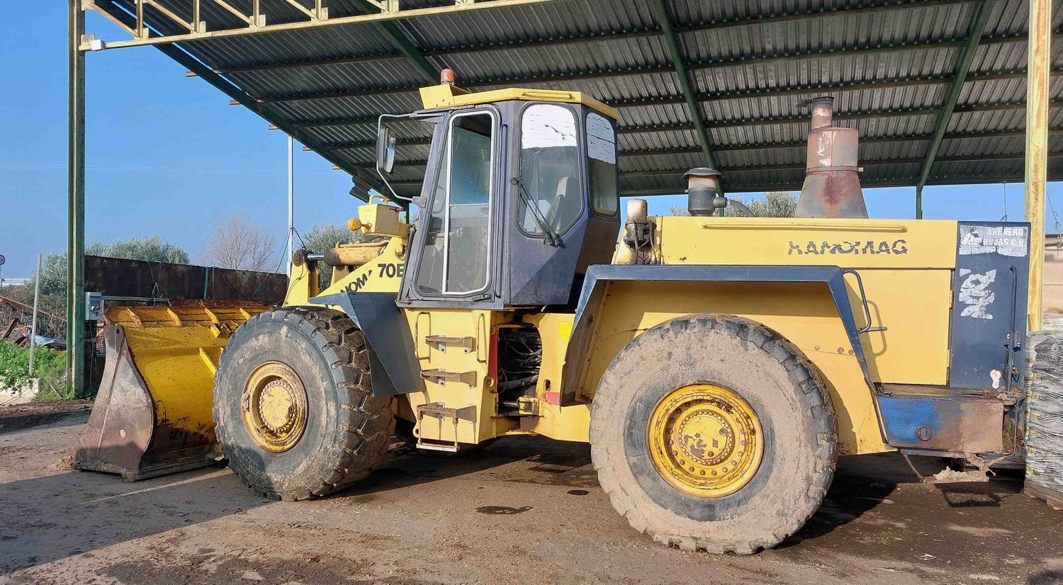 pala cargadora hanomag 70e movimiento tierra estiercol basura tierra rueda cazo retroexcavadora mixta retro excavadora jcb
