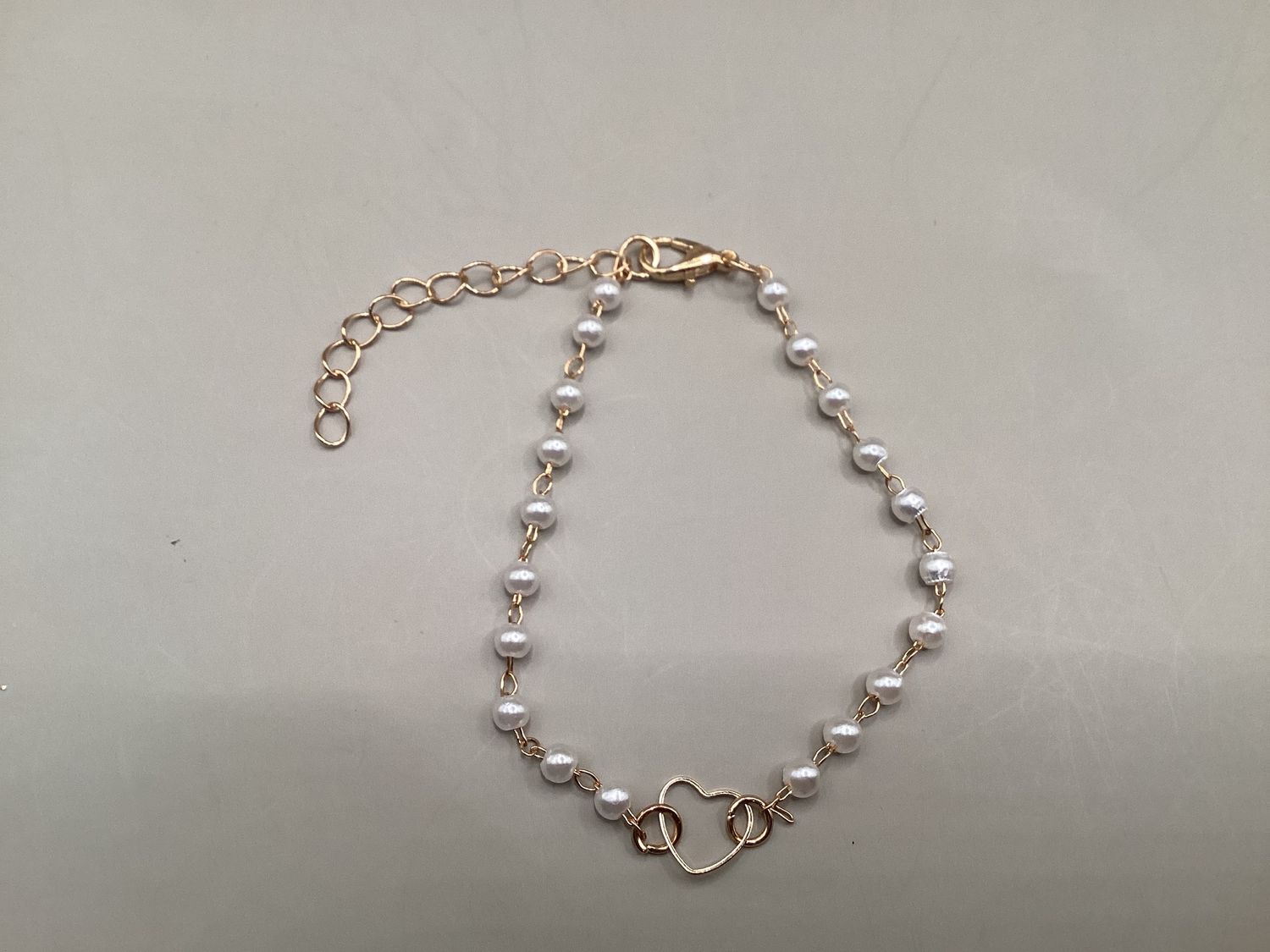 Pearl-like bracelet gold-tone