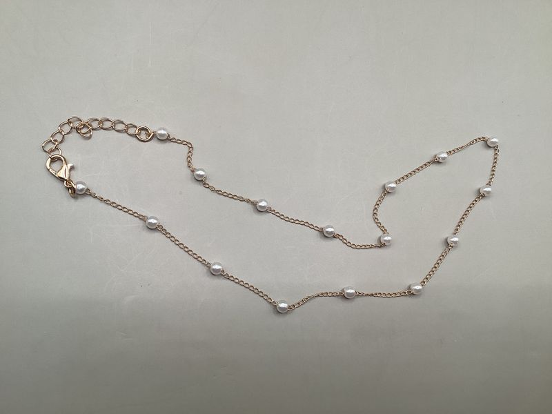 Delicate necklace with Pearl-like beads gold-tone