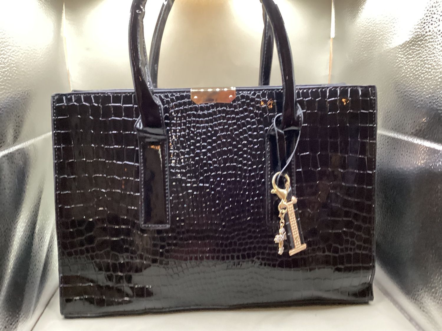 Textured Black Handbag with Gold Key Charm, Cross