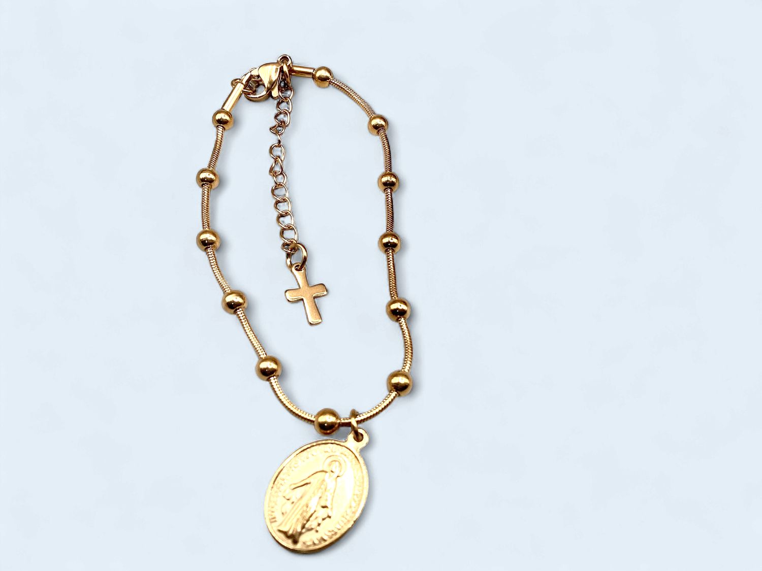 Catholic goldtone miraculous metal bracelet with cross charm