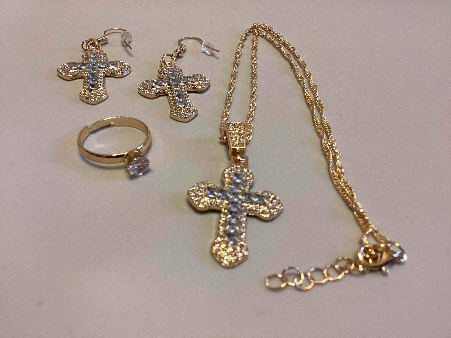 Elegant, gold-tone Cross jewelry set