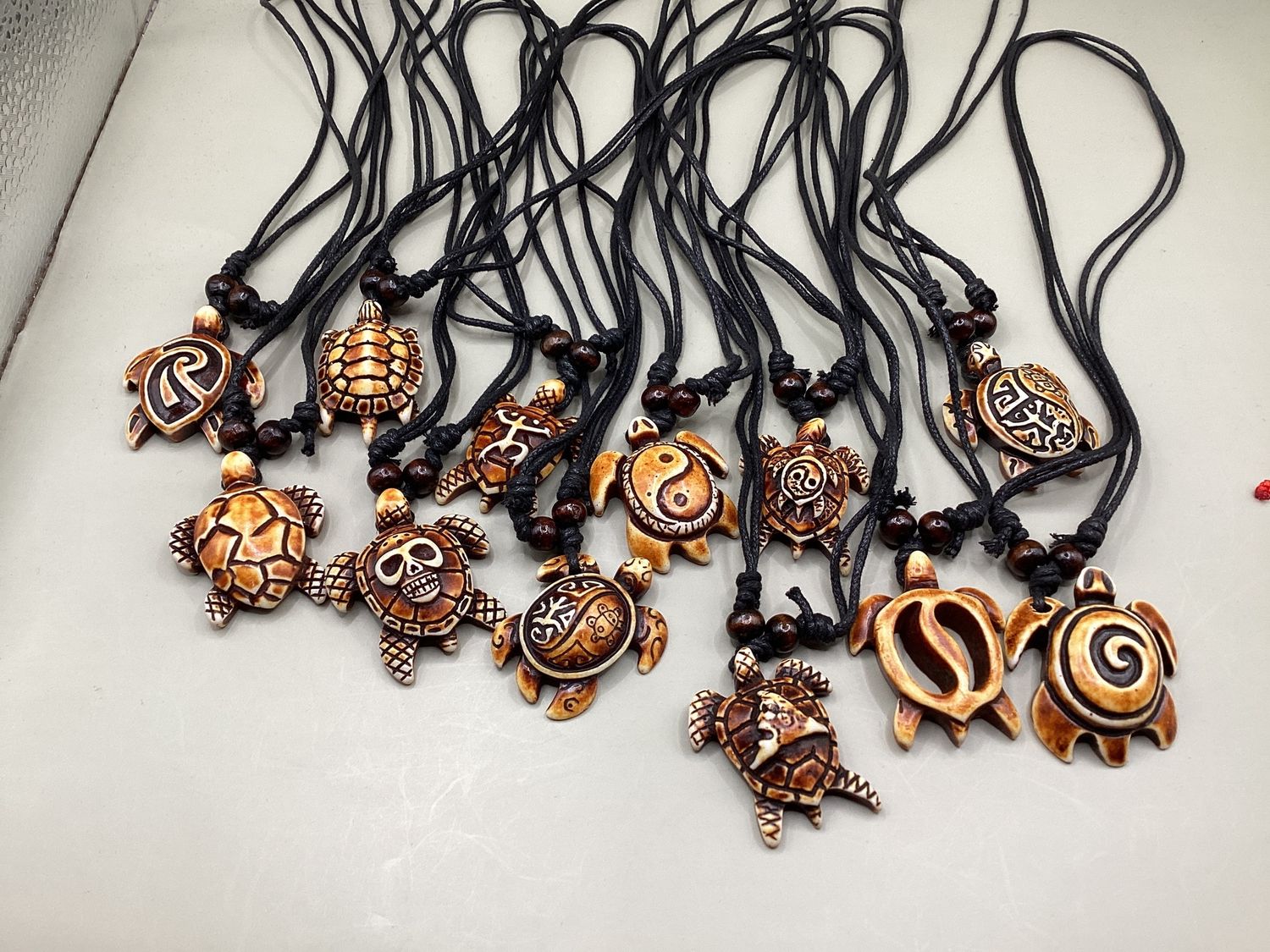 Turtles and more Turtles cord strung necklaces