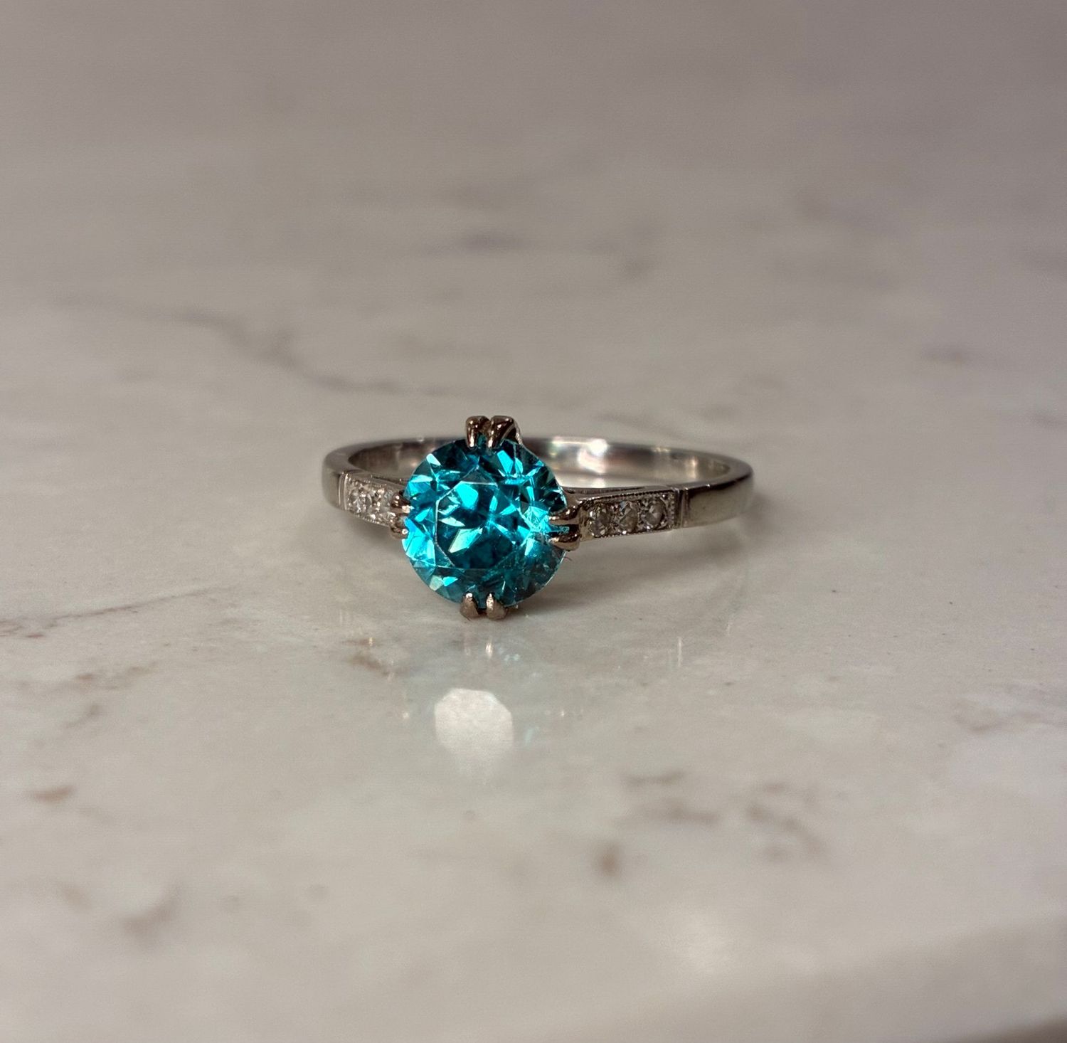 Vintage platinum zircon and diamond ring Vintage platinum zircon and diamond ring