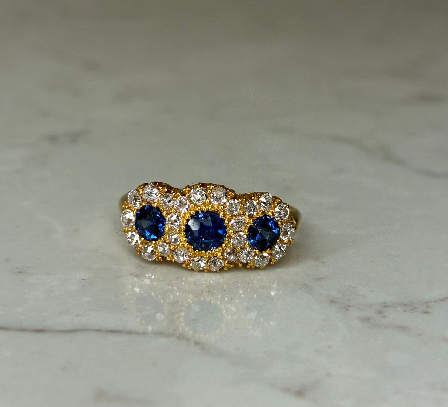 Vintage 18ct yellow gold, triple sapphire and diamond cluster ring Vintage 18ct yellow gold, triple sapphire and diamond cluster ring