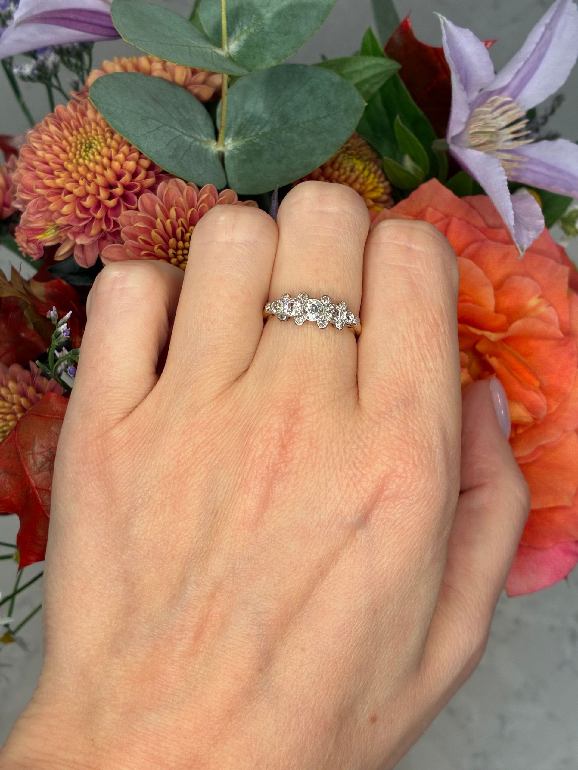 Early 20th century platinum and 18ct yellow gold diamond five stone ring