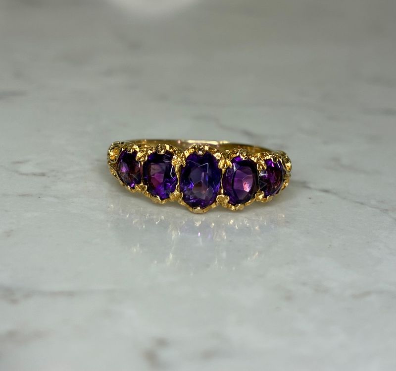 Edwardian 9ct gold five-stone amethyst ring