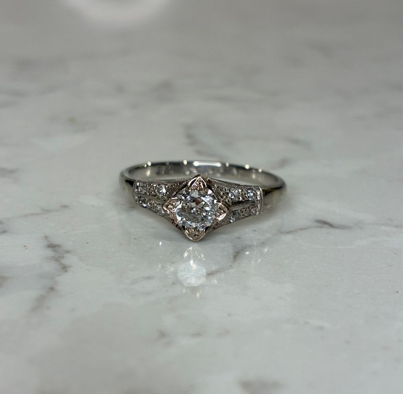 Mid 20th century 18ct white gold & platinum solitaire diamond ring