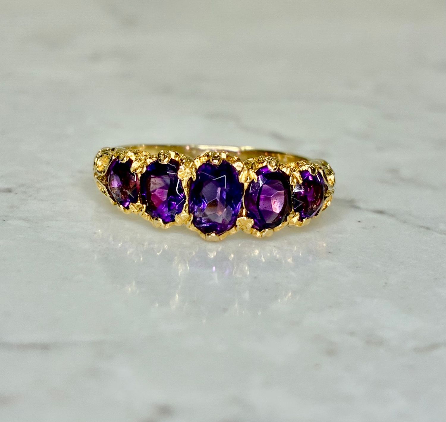 Edwardian 9ct gold five-stone amethyst ring