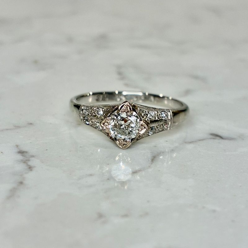 Mid 20th century 18ct white gold & platinum solitaire diamond ring