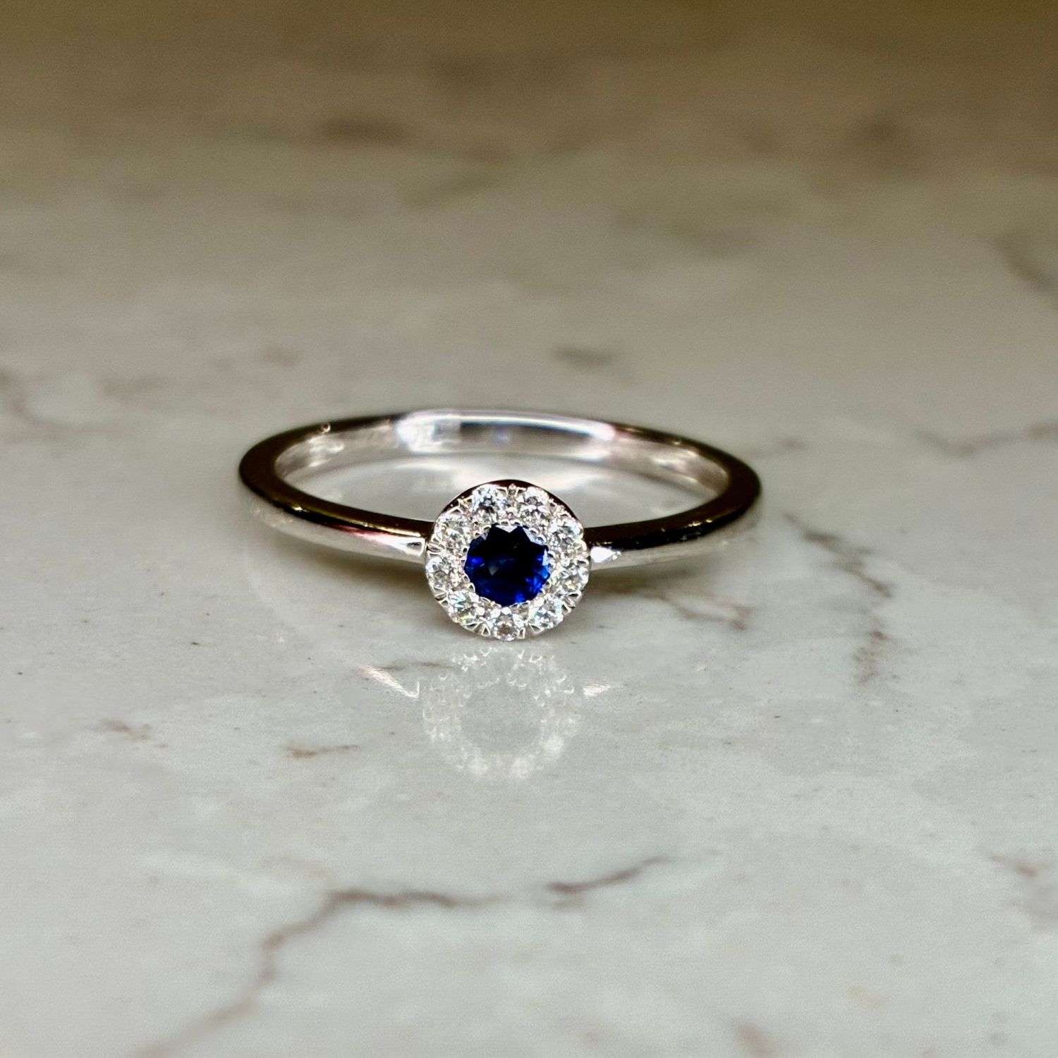 Lovely little vintage 18ct white gold sapphire and diamond halo ring