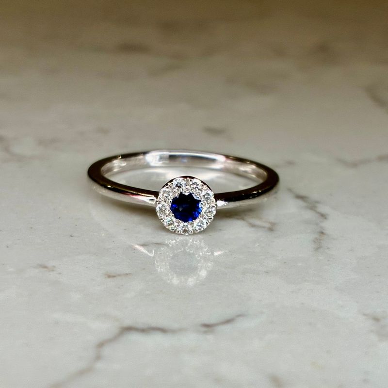 Lovely little vintage 18ct white gold sapphire and diamond halo ring