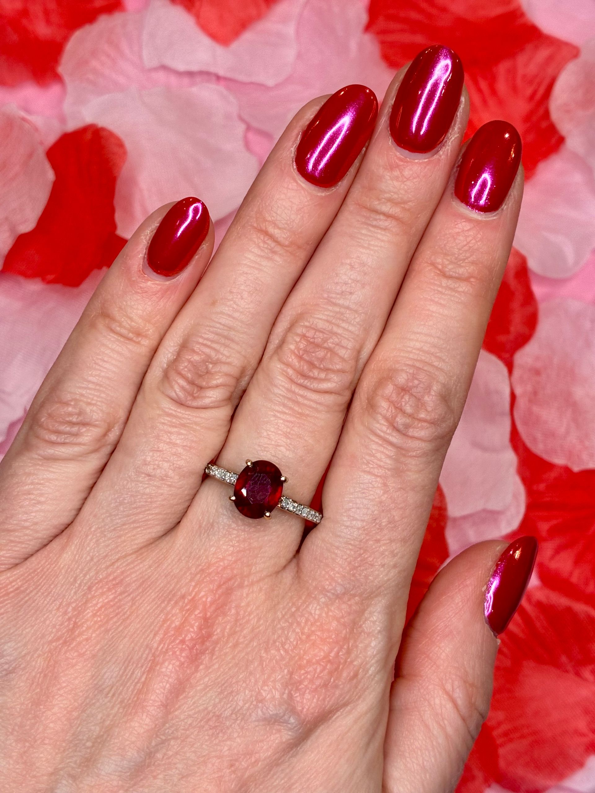 Vintage 9ct yellow gold ruby solitaire with diamond shoulders