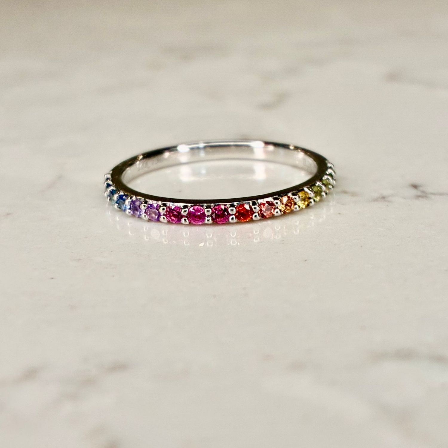 18ct white gold rainbow gem-set band