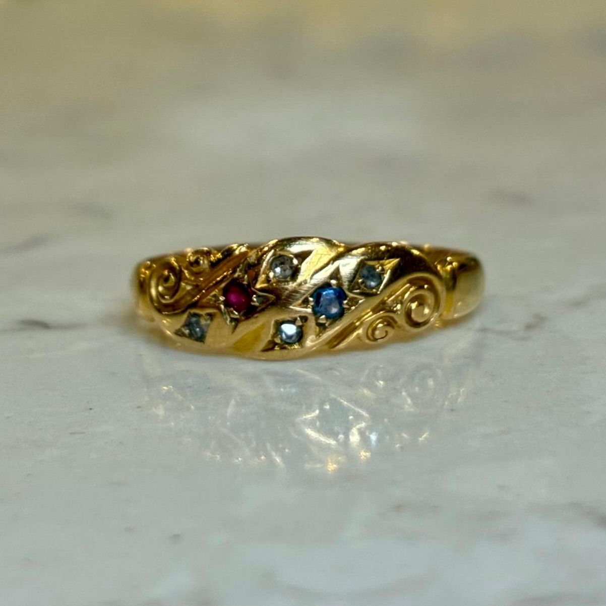 Antique 18ct yellow gold ruby, diamond and sapphire ring