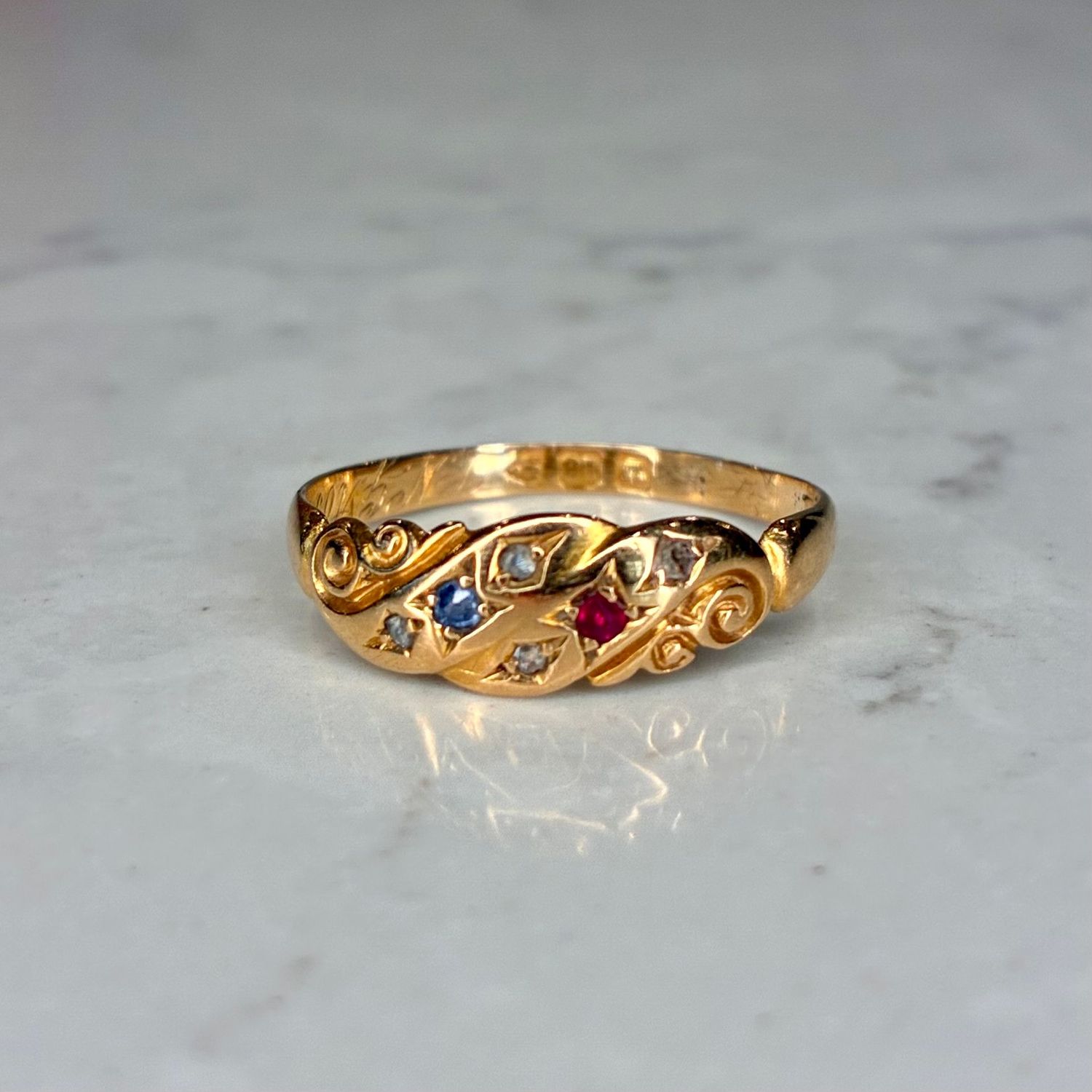 Antique 18ct yellow gold ruby, diamond and sapphire ring