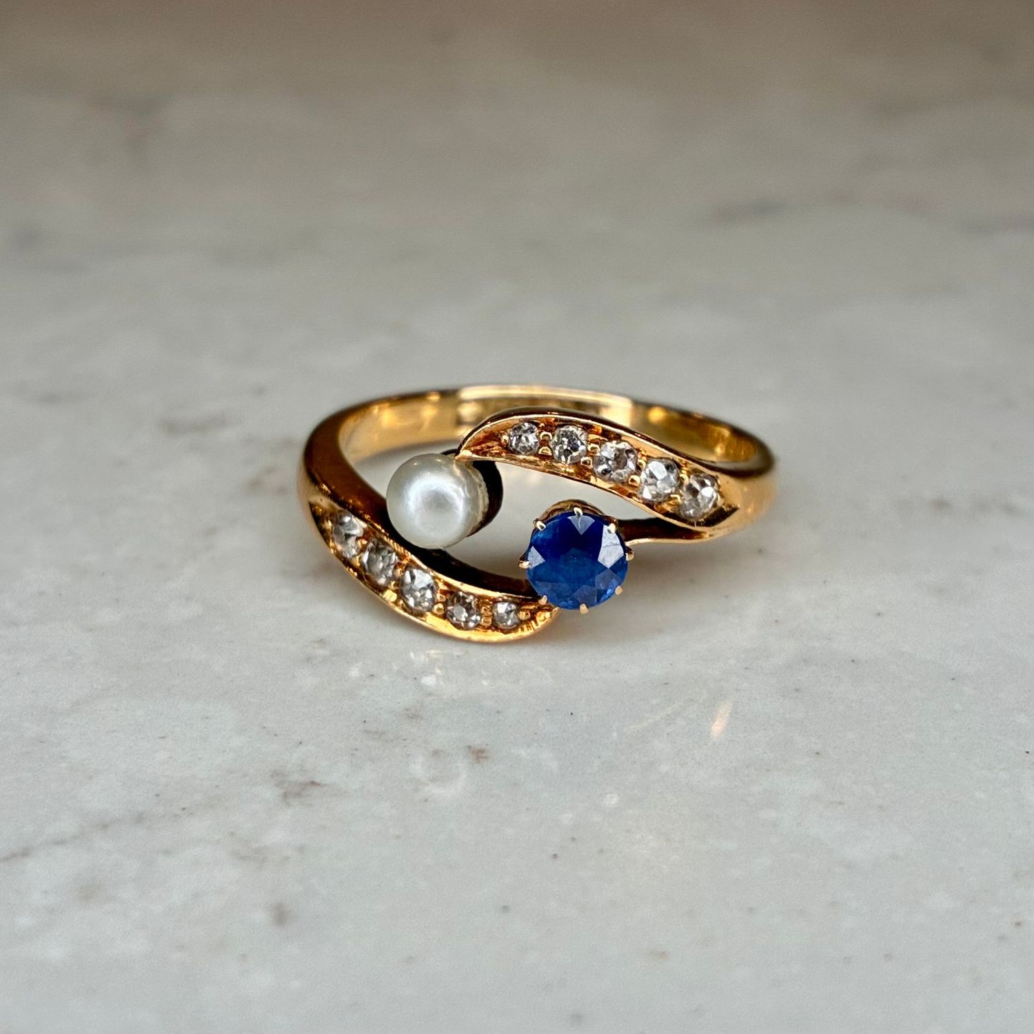 Edwardian 18ct yellow gold sapphire, diamond & pearl crossover ring