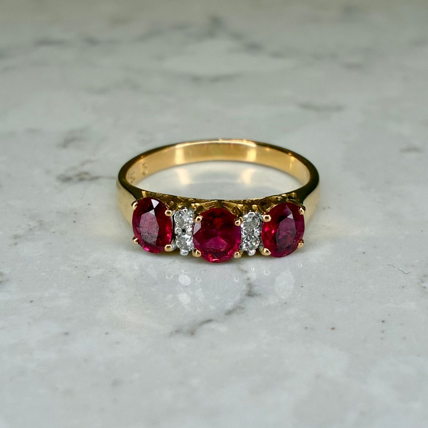 Vintage 18ct ruby & diamond seven-stone ring