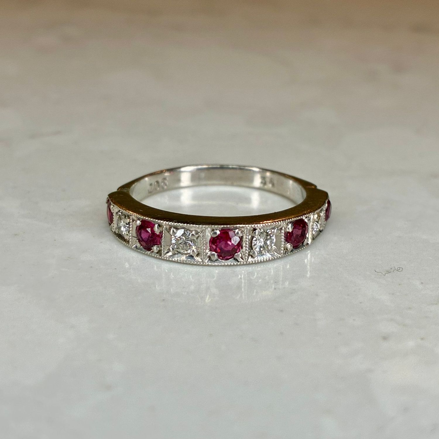 Vintage 9ct white gold ruby & diamond half-hoop ring Vintage 9ct white gold ruby & diamond half-hoop ring