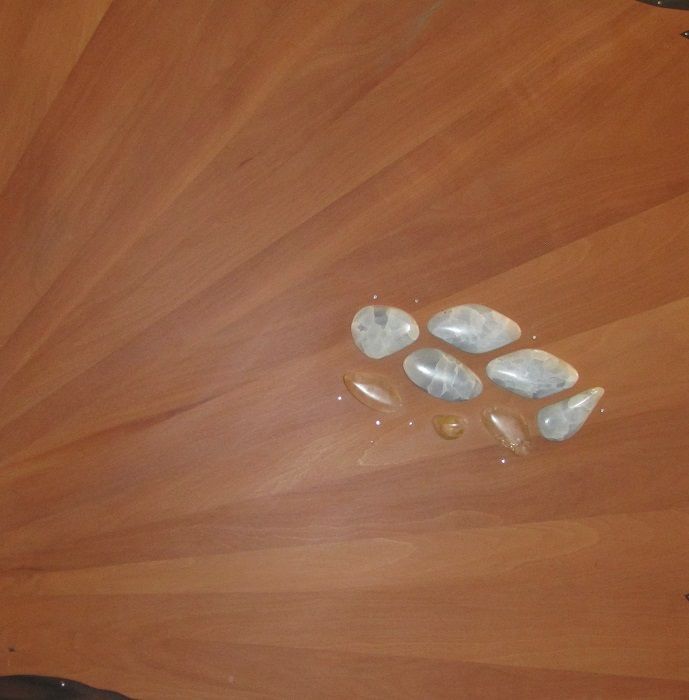 First Light II, Blue calcite and rose quartz raised inlays on steamed pear with micro pink sapphire and topaz set in gold bezel mounts