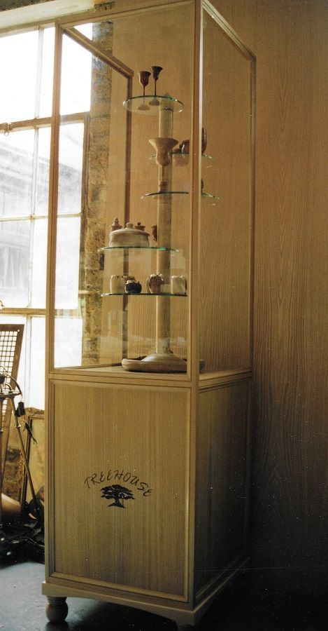 Glazed contemporary display case in chestnut with marquetry company logo, COMMISSION ONLY