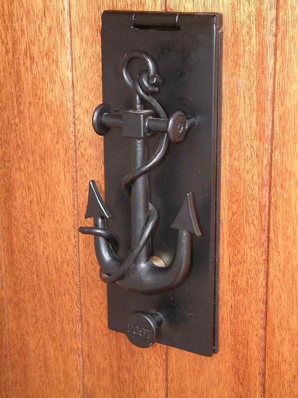 Anchor door knocker and post flap