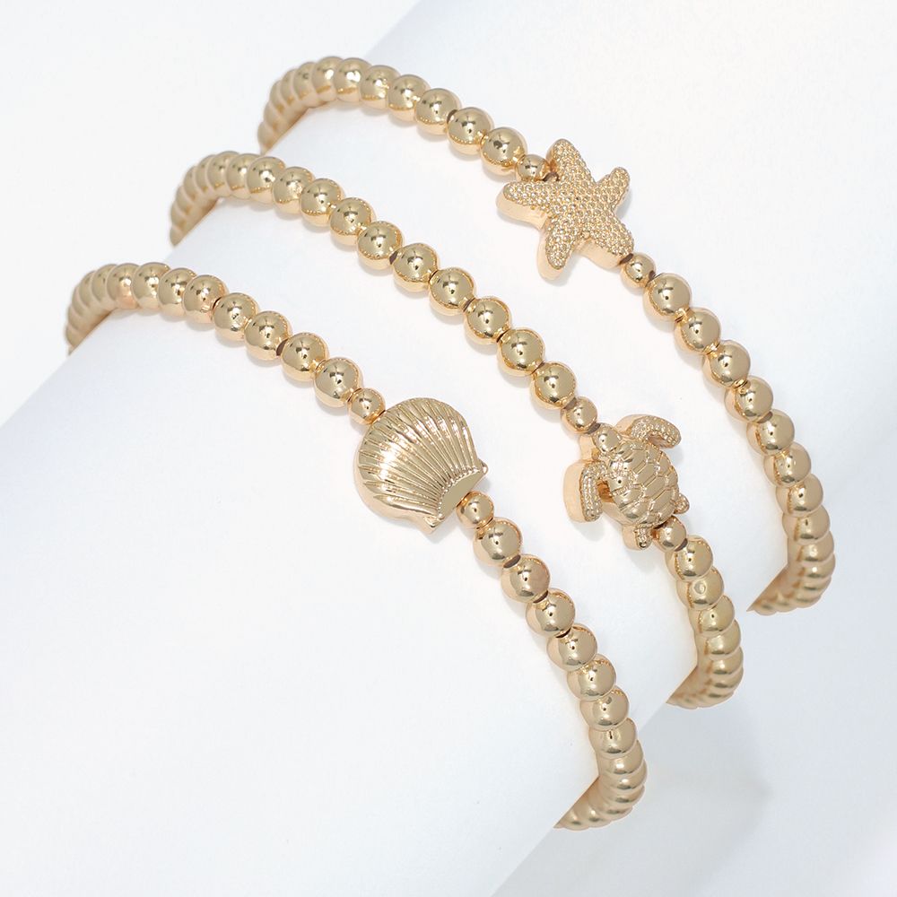 BRACELET - ASSORT  GOLD SEA LIFE