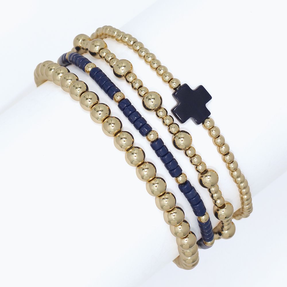 BRACELET - GOLD &amp; NAVY BEADS &amp; CROSS