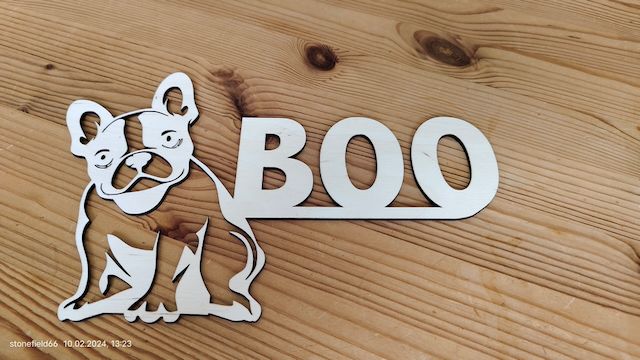 Tiermotiv mit Namen hängend