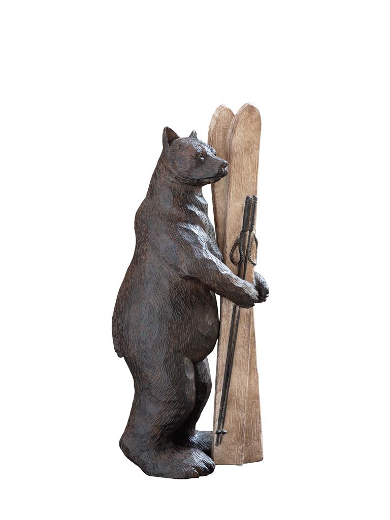 Bear Holding Skis