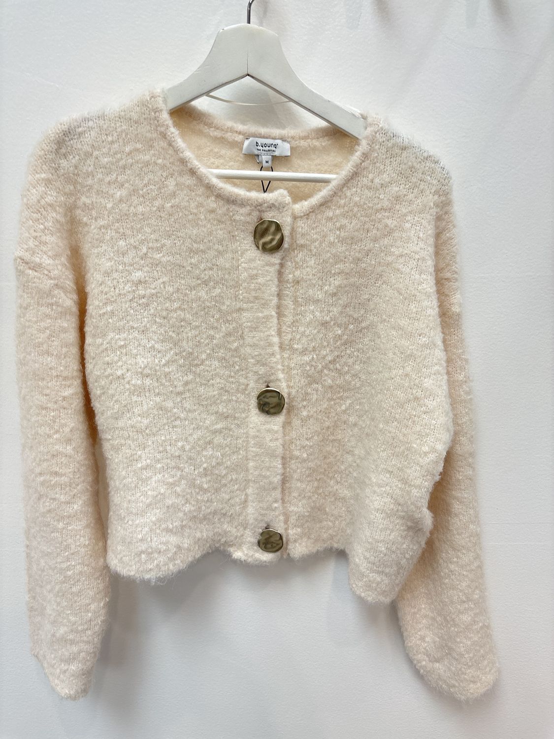 Cream cardigan with gold buttons