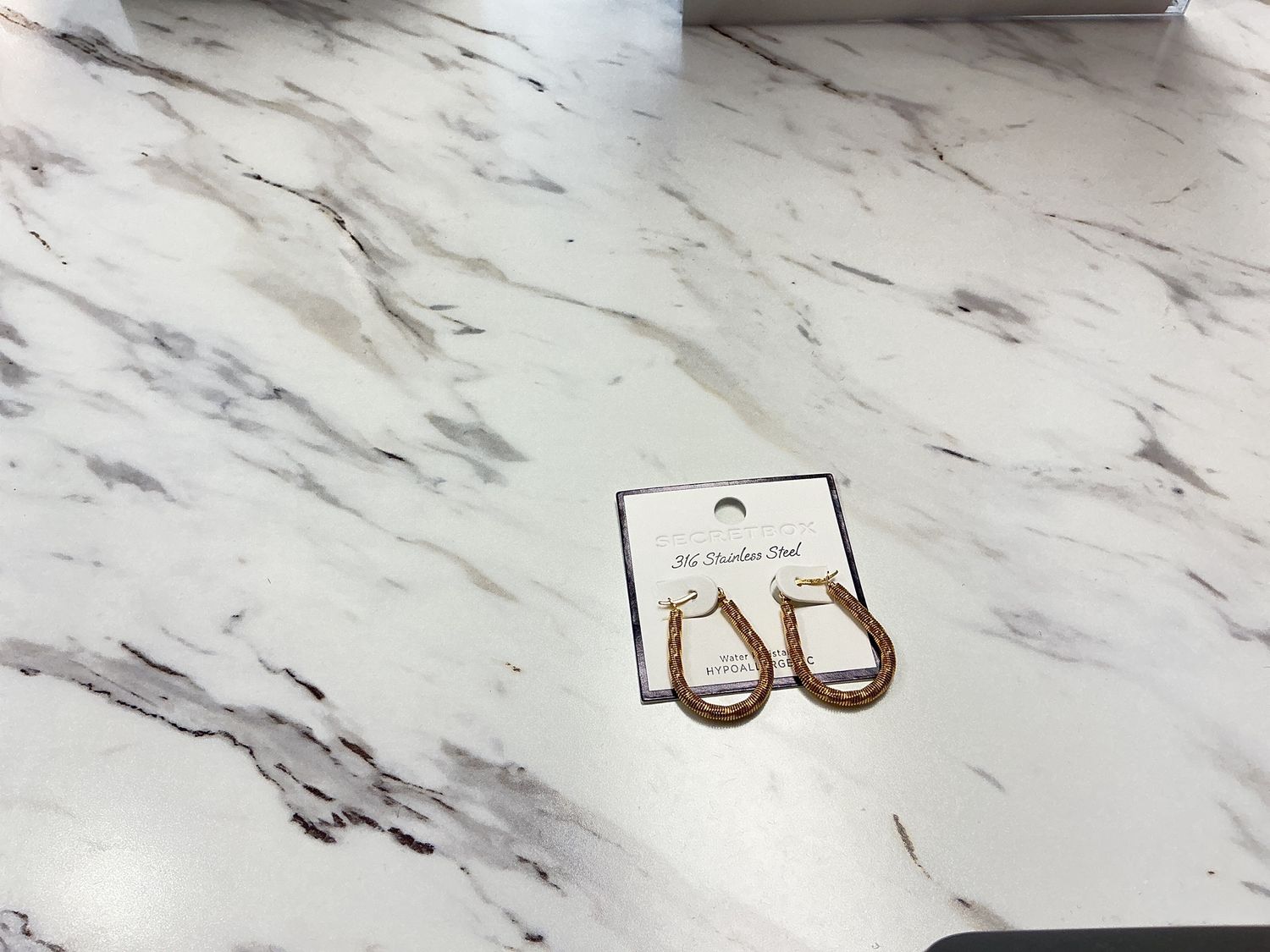 Stainless steel gold earrings with texture