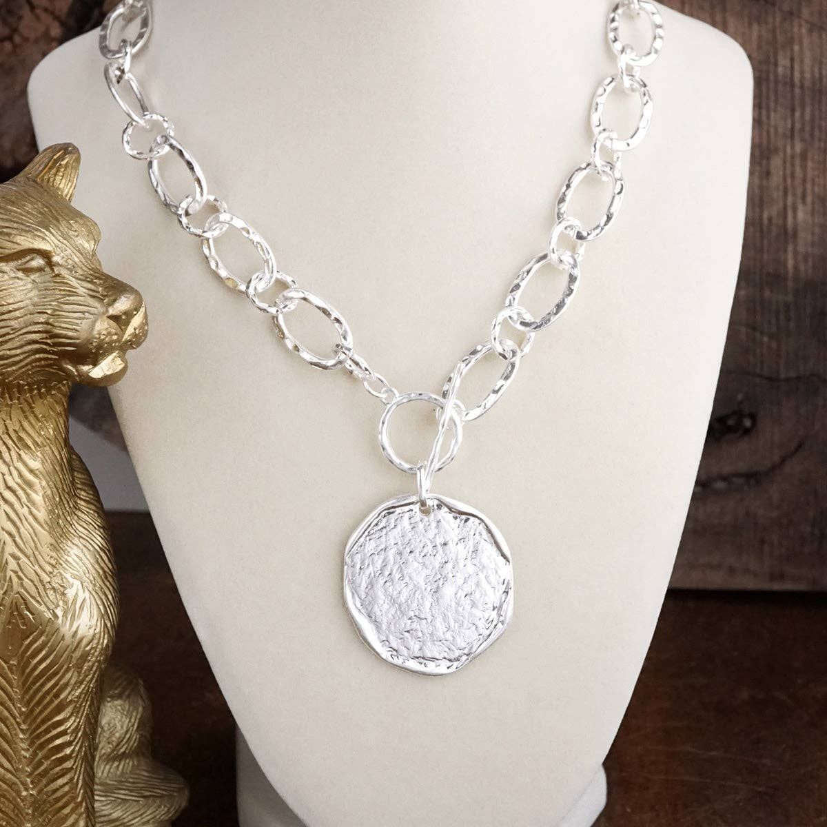 Nomad Glow – Front Toggle Statement Necklace with Hammered Disc, Color: Worn Silver Tone