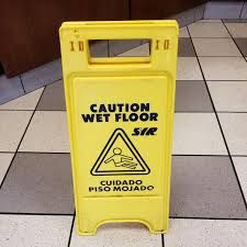 "A" Economy Caution Wet Floor sign English/Spanish