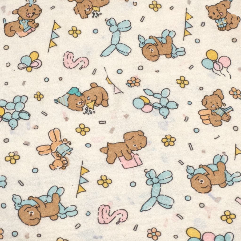 Mousseline de coton – Chiens festifs pastel
